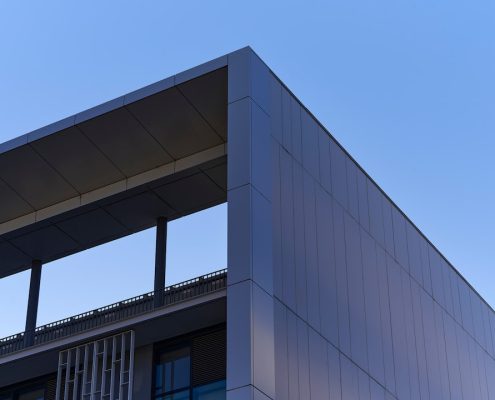 commercial roofing low-slope building exterior modern flat roof April 2026 - commercial roofing options and what to expect