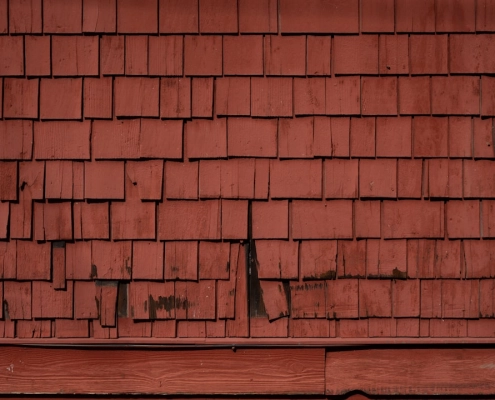 high wind shingle damage - does insurance cover roof replacement