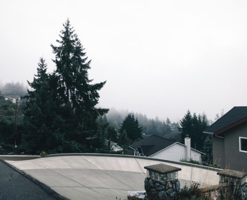 water damage prevention tips Pacific Northwest home in heavy rainstorm - water damage prevention tips for pacific northwest