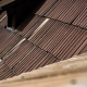 roofing material samples displayed on a roof surface showing different textures and colors