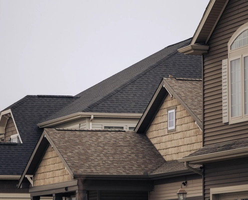 roof age insurance claim home with aging shingles in Pacific Northwest