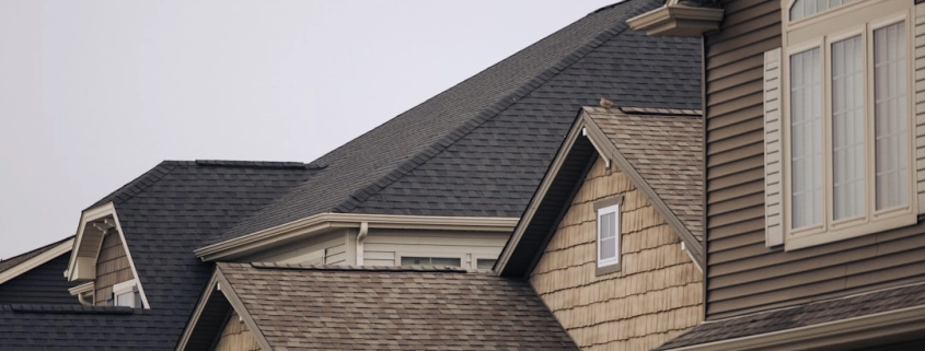 roof age insurance claim home with aging shingles in Pacific Northwest