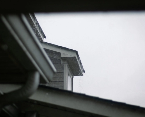 gutter styles and materials compared on a residential home in Beaverton Oregon